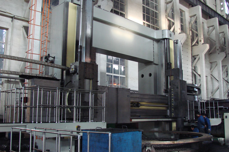 The 6-meter double-column vertical lathe, showcasing its massive frame and large turning table.