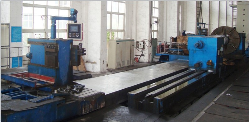 The Ht250×120×80 heavy-duty horizontal CNC turning lathe, viewed from the side to show its long bed and headstock.