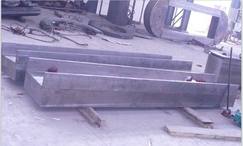 A structural frame component for an isostatic press, designed to withstand extreme operational forces.