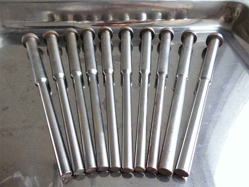 A precision-machined small supercharger plunger, engineered from hardened steel for use in high-pressure isostatic presses.