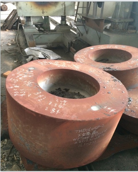 Forged upper end cap for a Warm Isostatic Press (WIP) system.